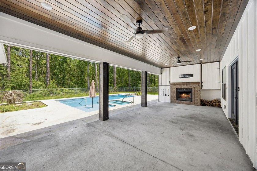 This custom-built home is situated on approximately 3 acres and - photo 6