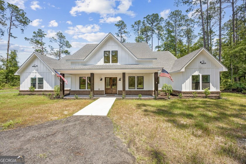 This custom-built home is situated on approximately 3 acres and - photo 8