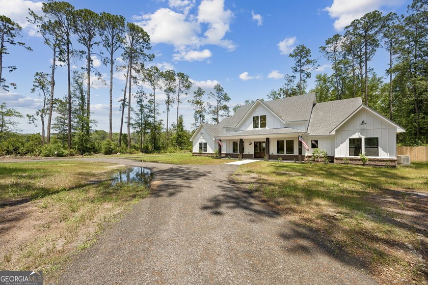This custom-built home is situated on approximately 3 acres and - photo 10