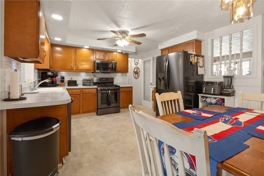 This ranch-style home offering a comfortable layout with bright - photo 12