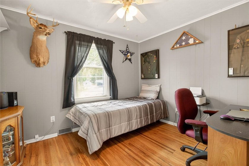 This ranch-style home offering a comfortable layout with bright - photo 18