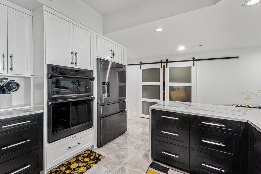 Beautifully upgraded 2 BR + den, 2 remodeled BA overlooking the - photo 12