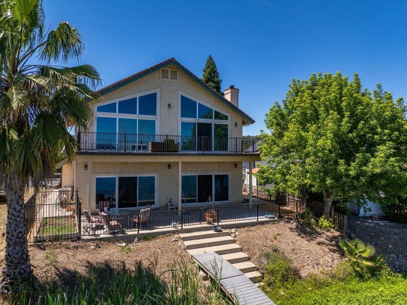 Where luxury meets the shoreline. This stunning custom-built - photo 5