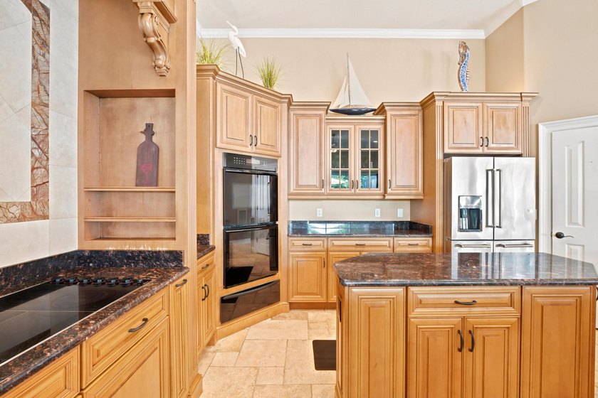 Nestled within the gated community of Soundside Shores, this - photo 14