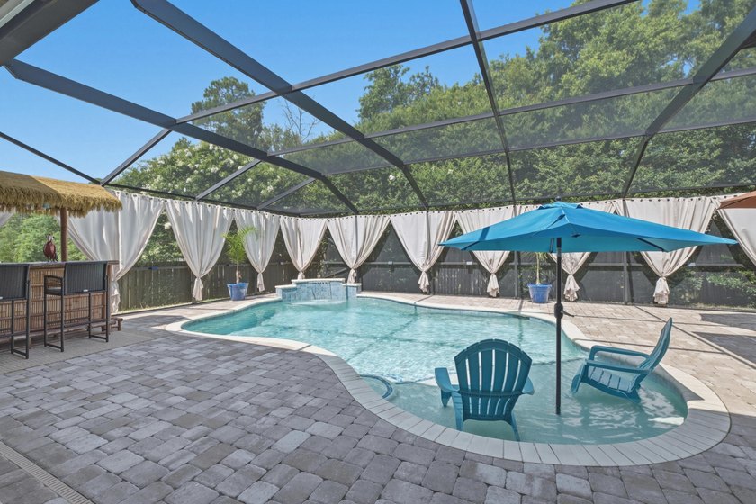 Nestled within the gated community of Soundside Shores, this - photo 42