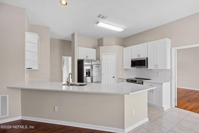 Welcome to this stunning lakefront retreat in the highly - photo 12
