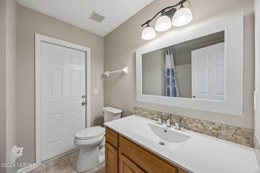 Welcome to this stunning lakefront retreat in the highly - photo 17