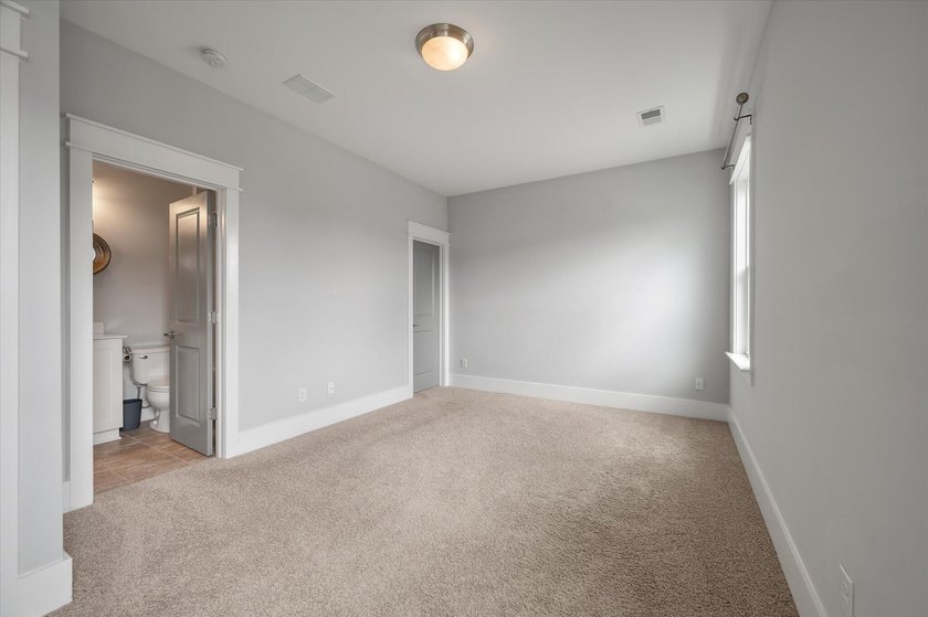 Thoughtfully designed &amp; upgraded throughout, this home impresses - photo 49