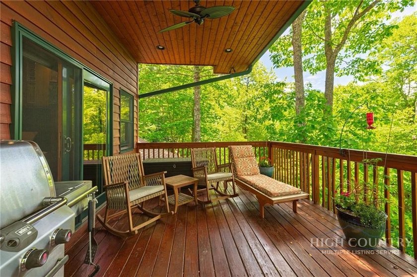 Magnificent home embraced by rhododendrons and hardwood trees - photo 6