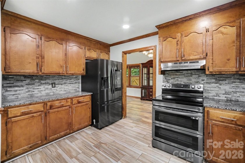 Nestled on approximately half an acre, this beautifully - photo 15