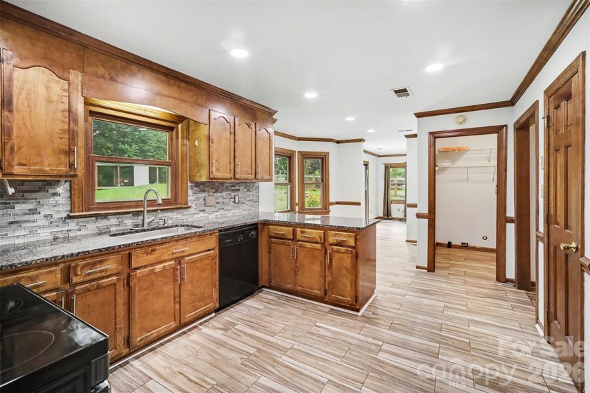 Nestled on approximately half an acre, this beautifully - photo 16