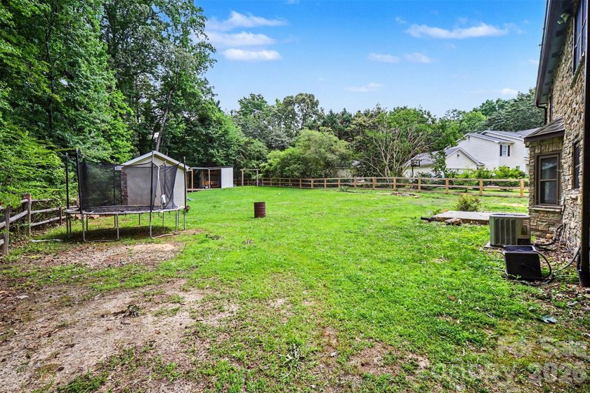 Nestled on approximately half an acre, this beautifully - photo 35