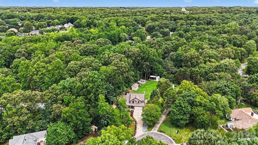 Nestled on approximately half an acre, this beautifully - photo 36