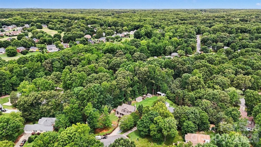 Nestled on approximately half an acre, this beautifully - photo 37