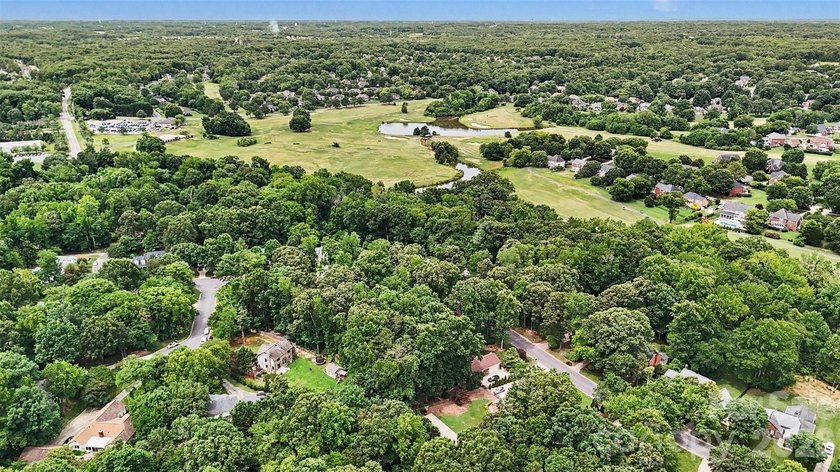 Nestled on approximately half an acre, this beautifully - photo 38