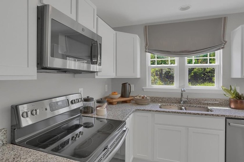 The Pearl Elevation *B* Gemcraft Homes New Construction is a - photo 6