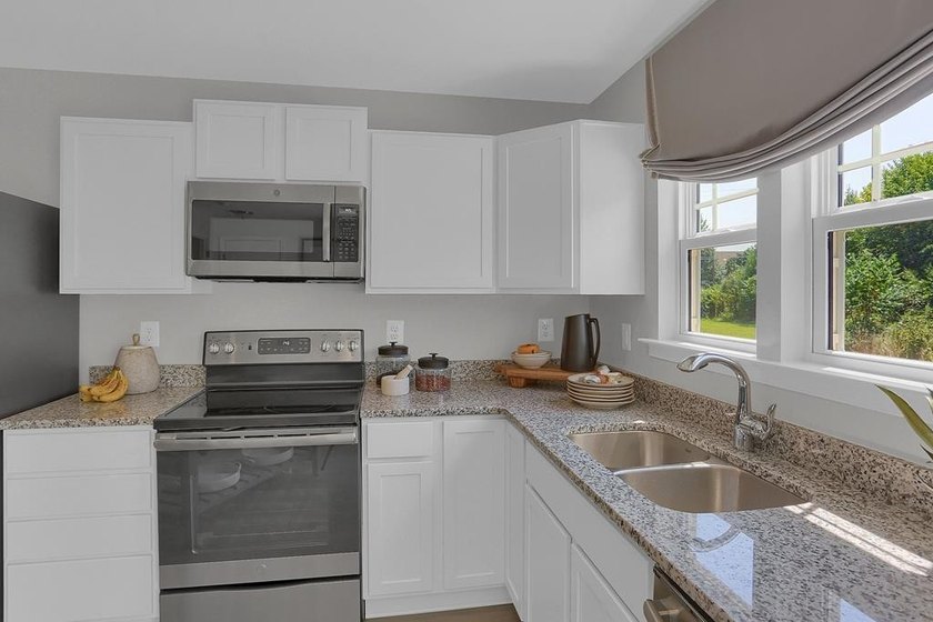 The Pearl Elevation *B* Gemcraft Homes New Construction is a - photo 8