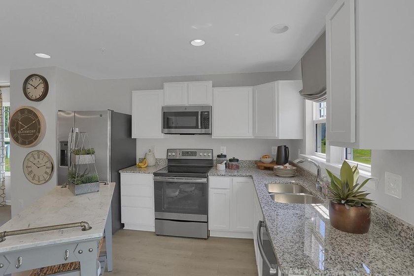 The Pearl Elevation *B* Gemcraft Homes New Construction is a - photo 9