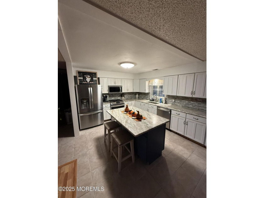 Home has all newer stainless steal appliances, granite counter - photo 16