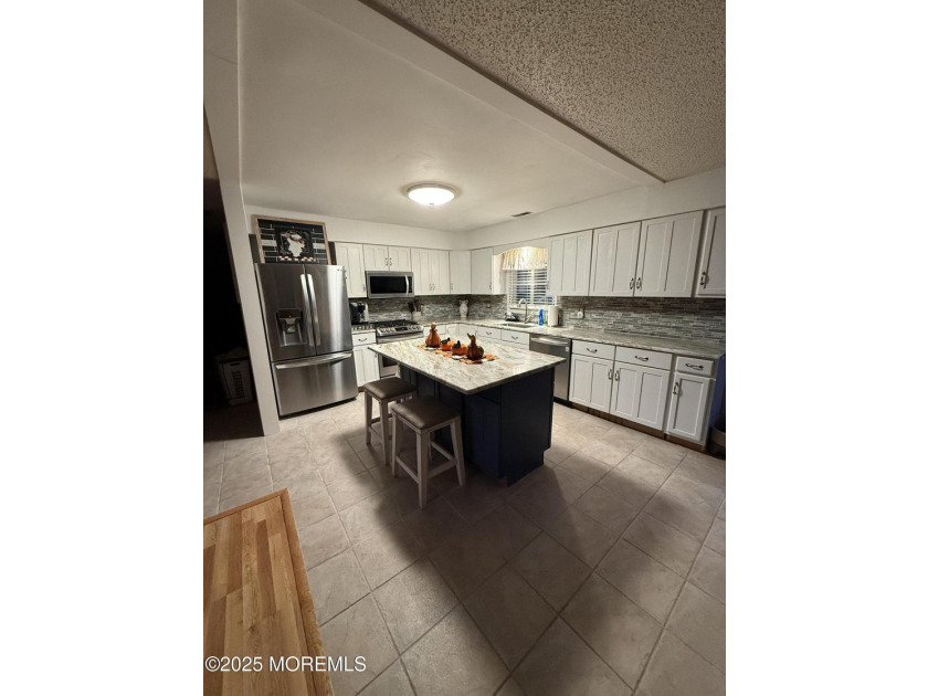 Home has all newer stainless steal appliances, granite counter - photo 20