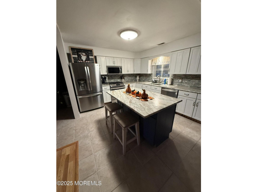 Home has all newer stainless steal appliances, granite counter - photo 21