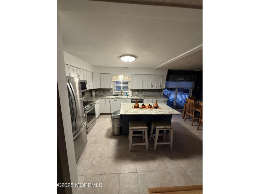 Home has all newer stainless steal appliances, granite counter - photo 22