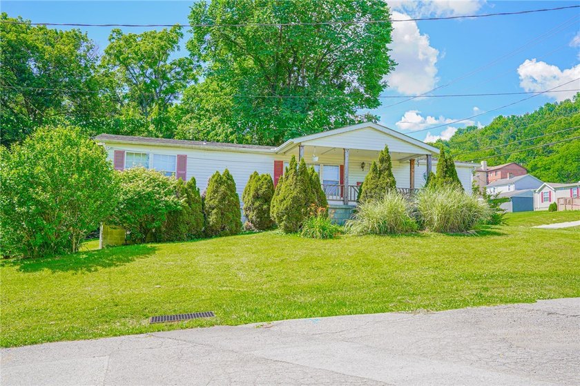 This SPACIOUS 3-bedroom, 2-bath ranch home sits on a corner lot - photo 3