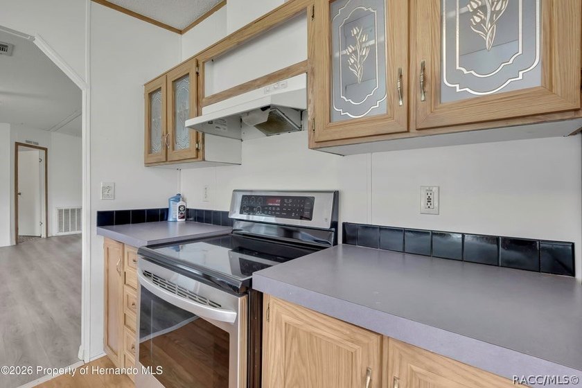 This nice spacious mobile home offers a well designed floor plan - photo 16