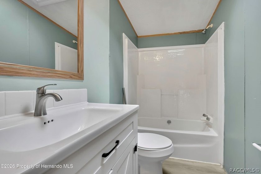 This nice spacious mobile home offers a well designed floor plan - photo 25