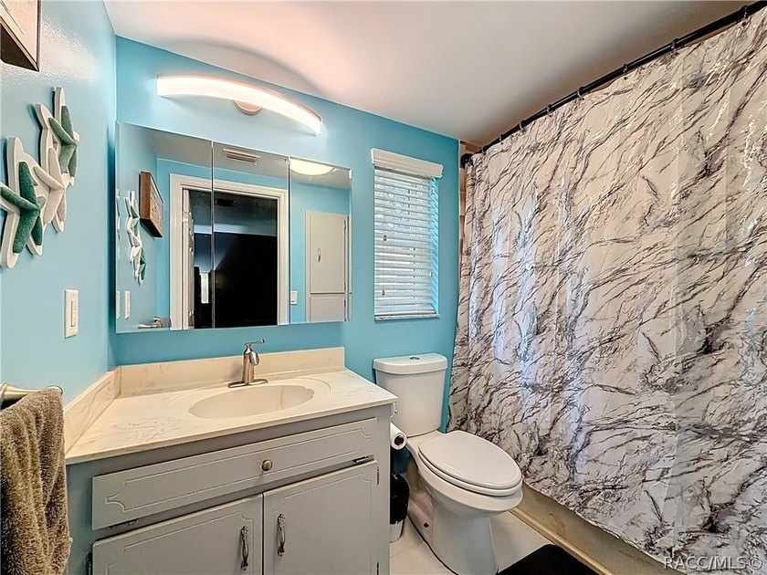 This updated 2-bedroom, 2-bathroom home at 11 Sweetgum Court - photo 17