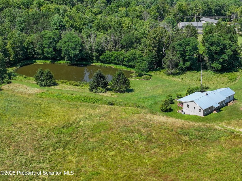 Country Living at its finest on 42 acres. Discover the perfect - photo 8