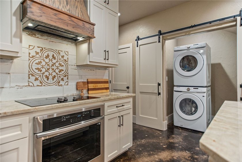 Custom-built barndominium blending charm with modern finishes - photo 11