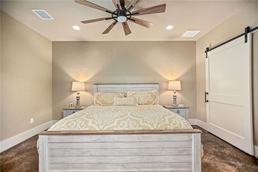 Custom-built barndominium blending charm with modern finishes - photo 13