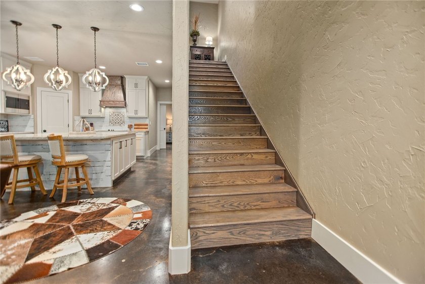 Custom-built barndominium blending charm with modern finishes - photo 17