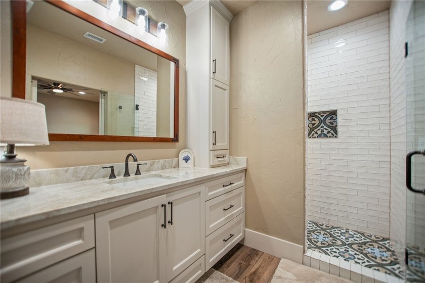 Custom-built barndominium blending charm with modern finishes - photo 21