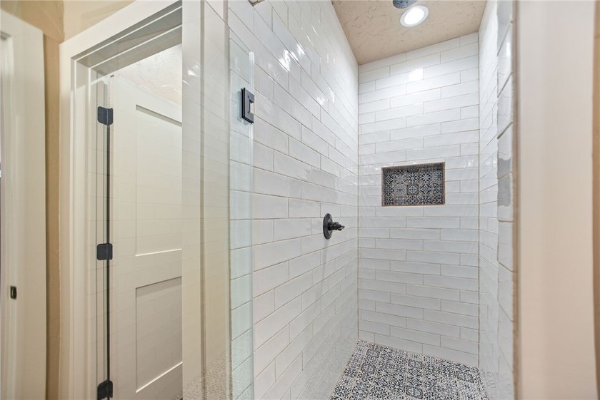 Custom-built barndominium blending charm with modern finishes - photo 24