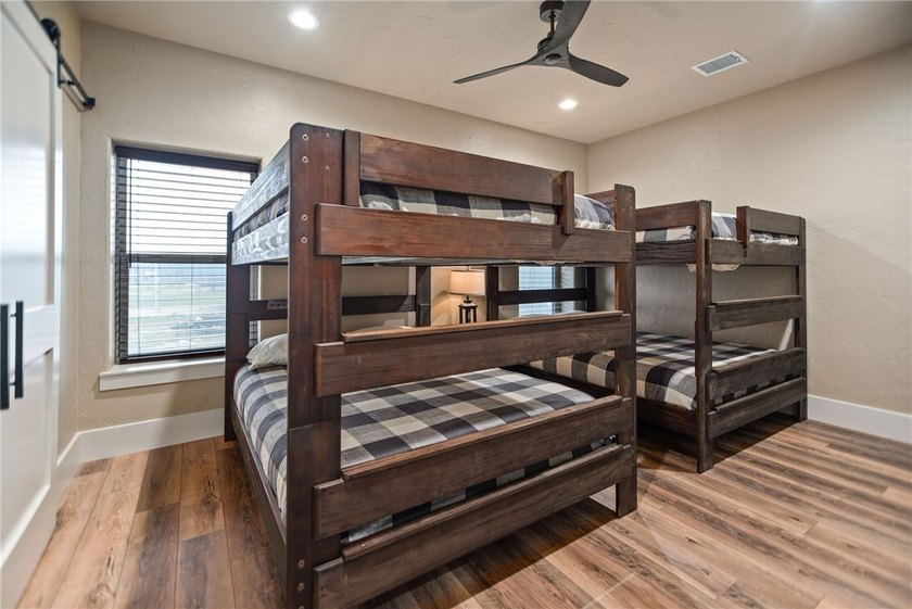 Custom-built barndominium blending charm with modern finishes - photo 27