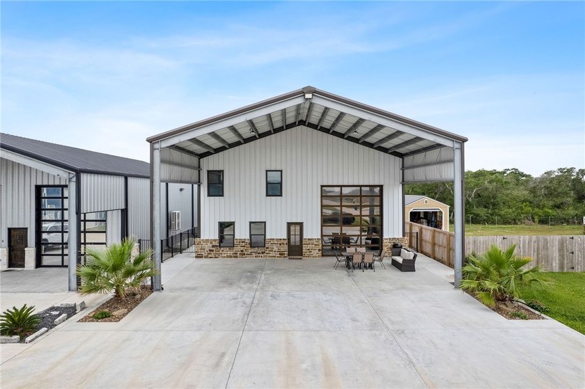 Custom-built barndominium blending charm with modern finishes - photo 31