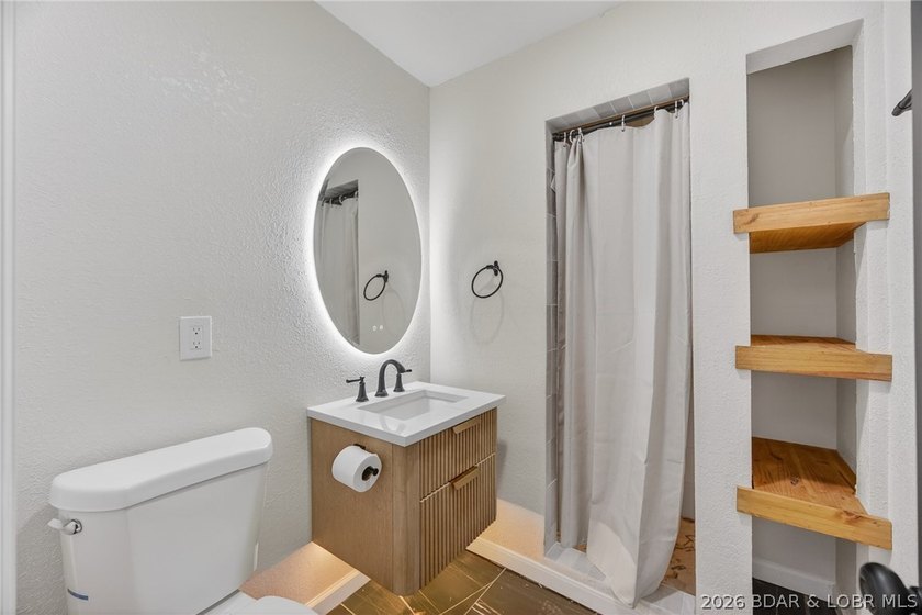 STUNNING, UPDATED LAKEFRONT OASIS IN AN UNBEATABLE LOCATION! - photo 23