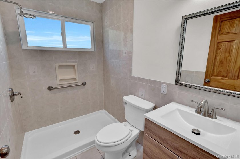 Lovely Patchogue Living! Enjoy This Beautifully Designed And - photo 11