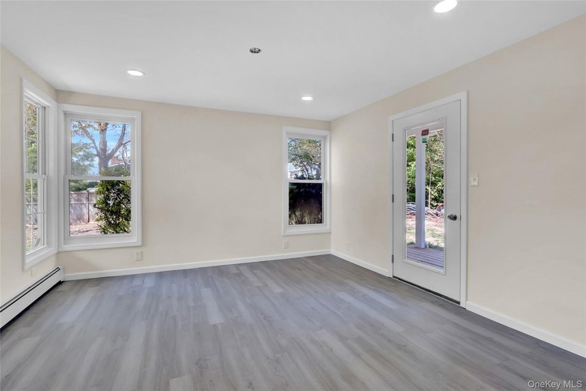Lovely Patchogue Living! Enjoy This Beautifully Designed And - photo 14