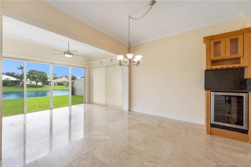 Located in the guard-gated community of The Meadows in Palm City - photo 21