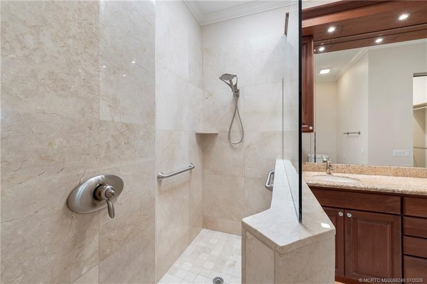Located in the guard-gated community of The Meadows in Palm City - photo 28