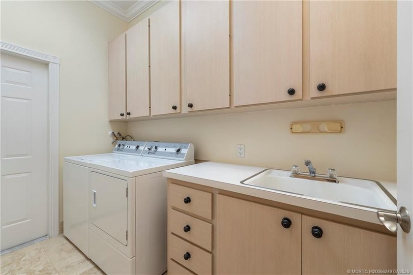 Located in the guard-gated community of The Meadows in Palm City - photo 34
