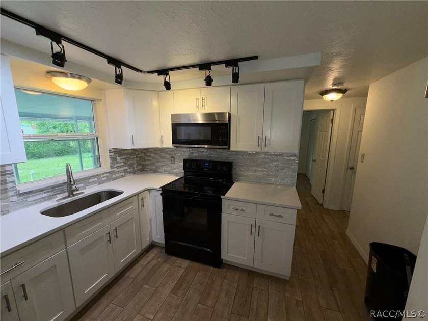 Move-in ready and beautifully updated, this inviting home - photo 37