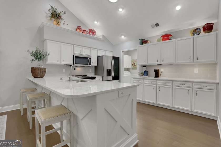 Beautifully updated and completely turnkey ranch home in the - photo 2