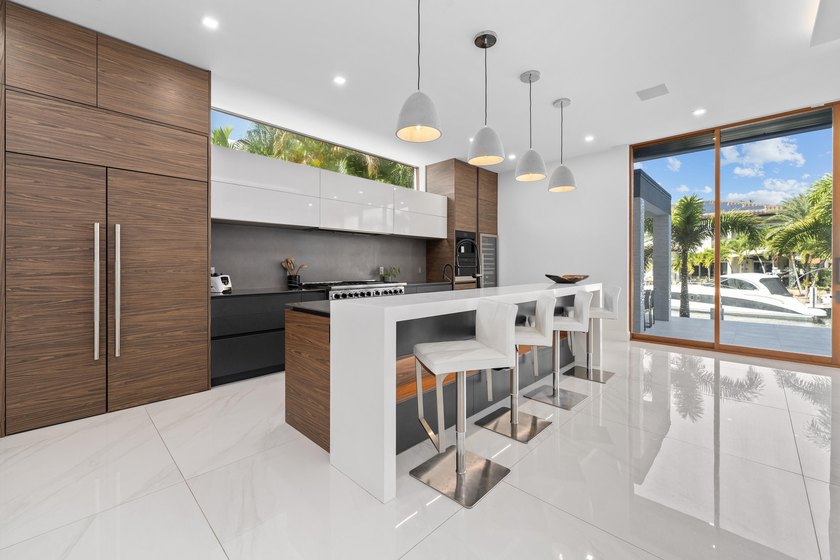 Experience unparalleled modern waterfront luxury in prestigious - photo 11