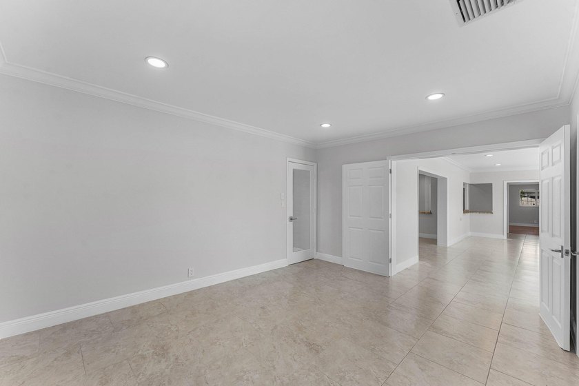 Experience luxury waterfront living in the prestigious Cove of - photo 17