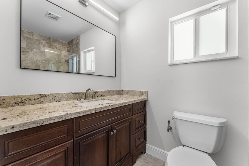 Experience luxury waterfront living in the prestigious Cove of - photo 19
