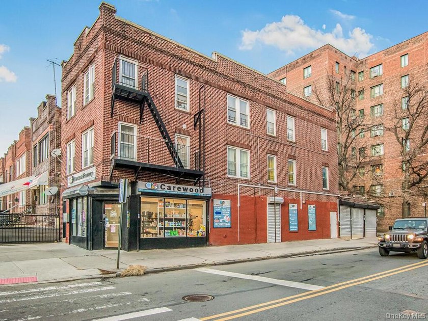 Detached brick mixed-use building with R6 zoning located on busy - photo 29